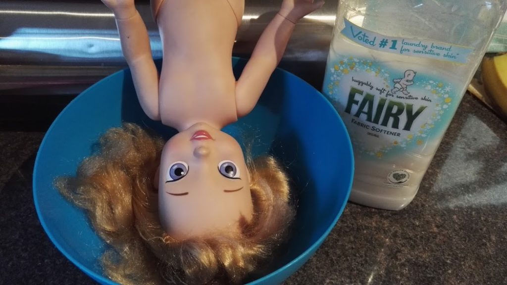 fixing matted doll's hair