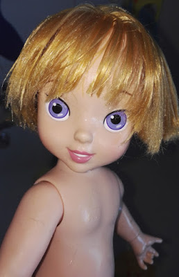 fixing matted doll's hair
