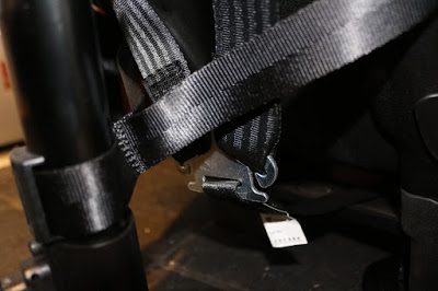 Removing the covers from an Axkid Minikid car seat