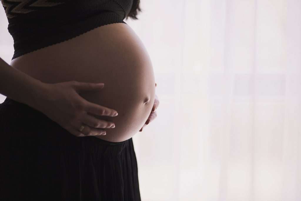 cesarean section surgery: c-section pregnant belly