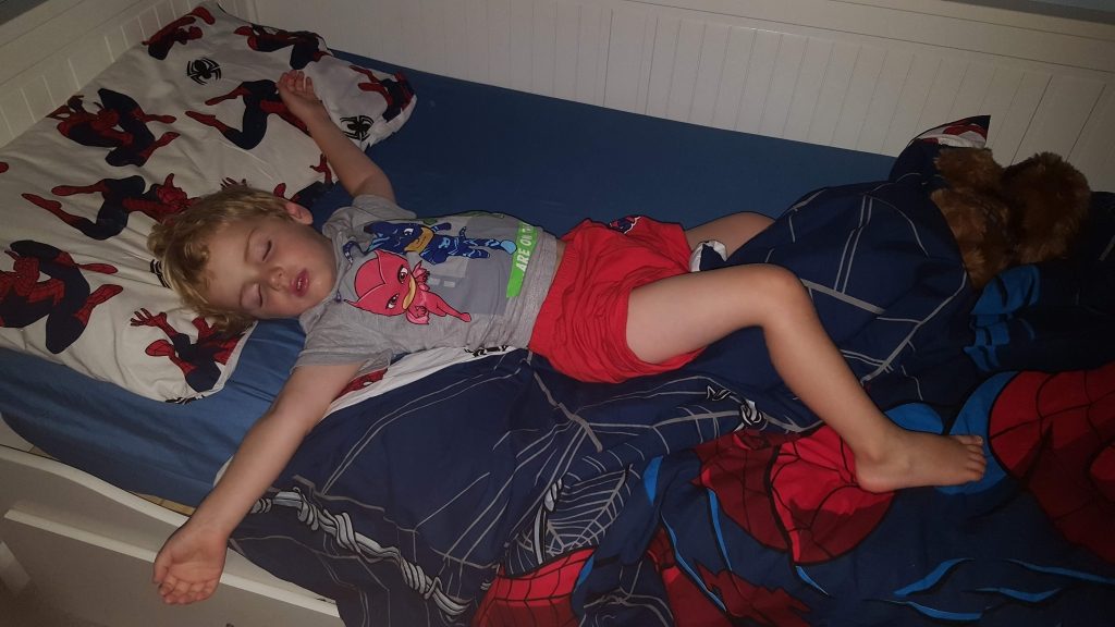 Asleep in bed