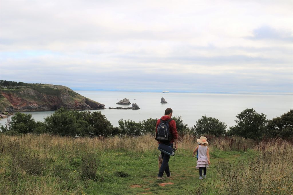 Walking over the fields to the sea - packing for a UK staycation holiday