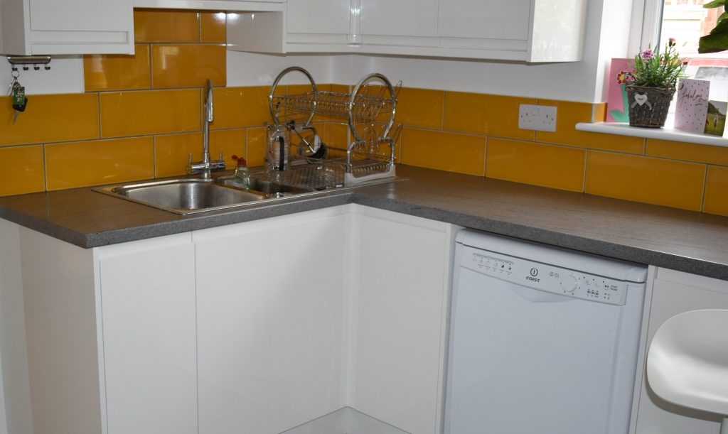 Sink in our new white howdens kitchen