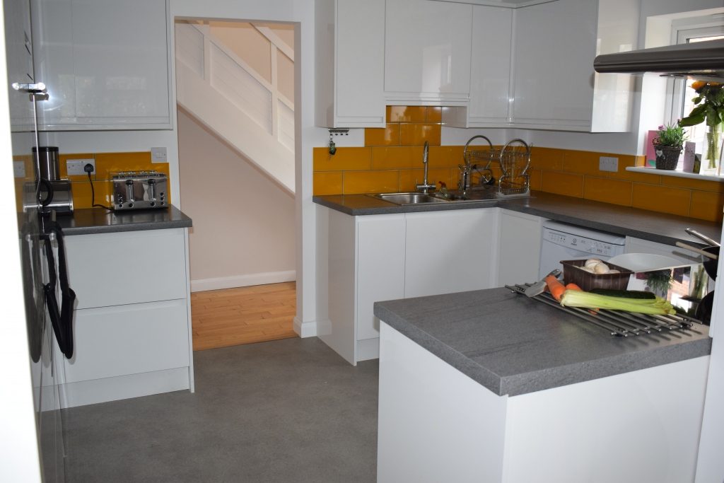 The kitchen, white and grey
