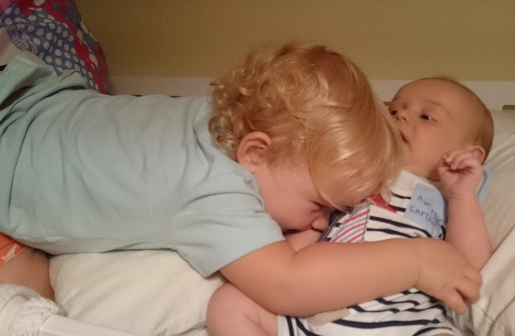 Toddler and a baby
