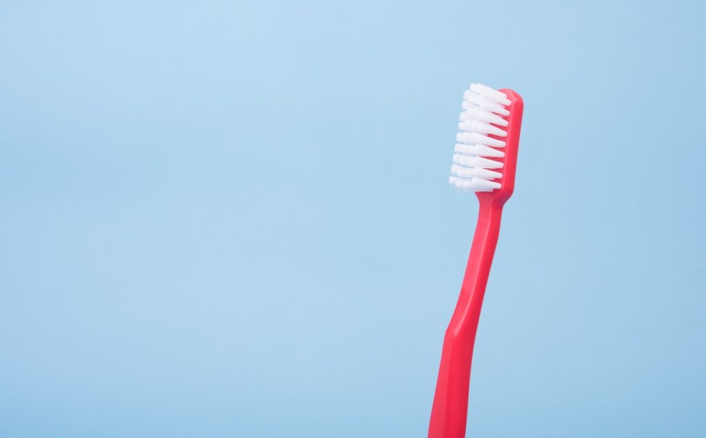 toothbrush - picking a family dentist