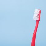 toothbrush - picking a family dentist