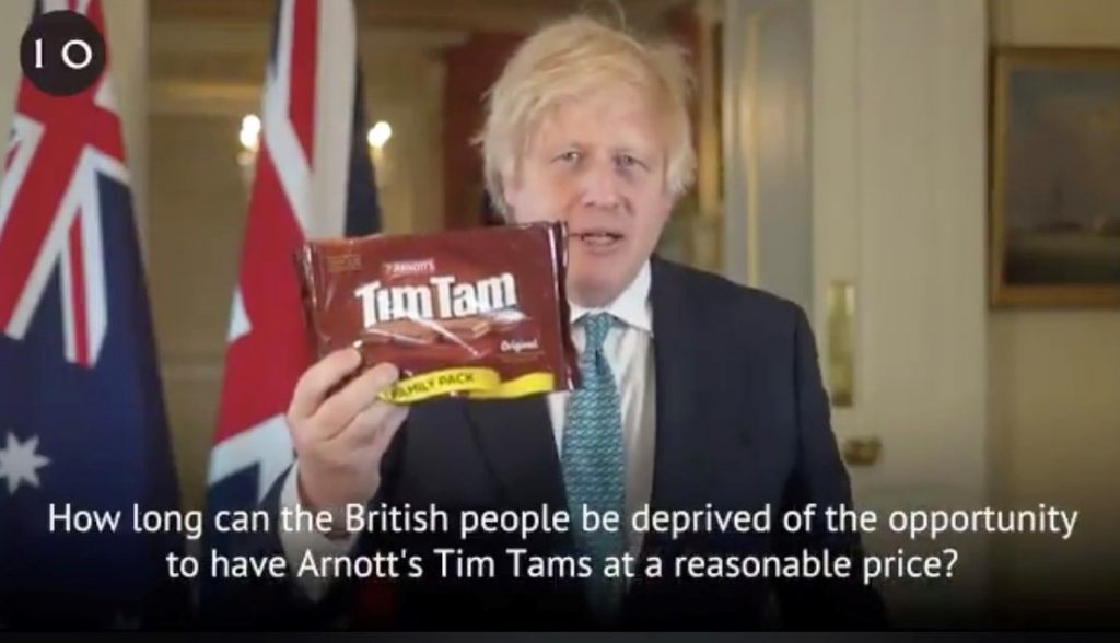 Boris is a cunt holding tim tams