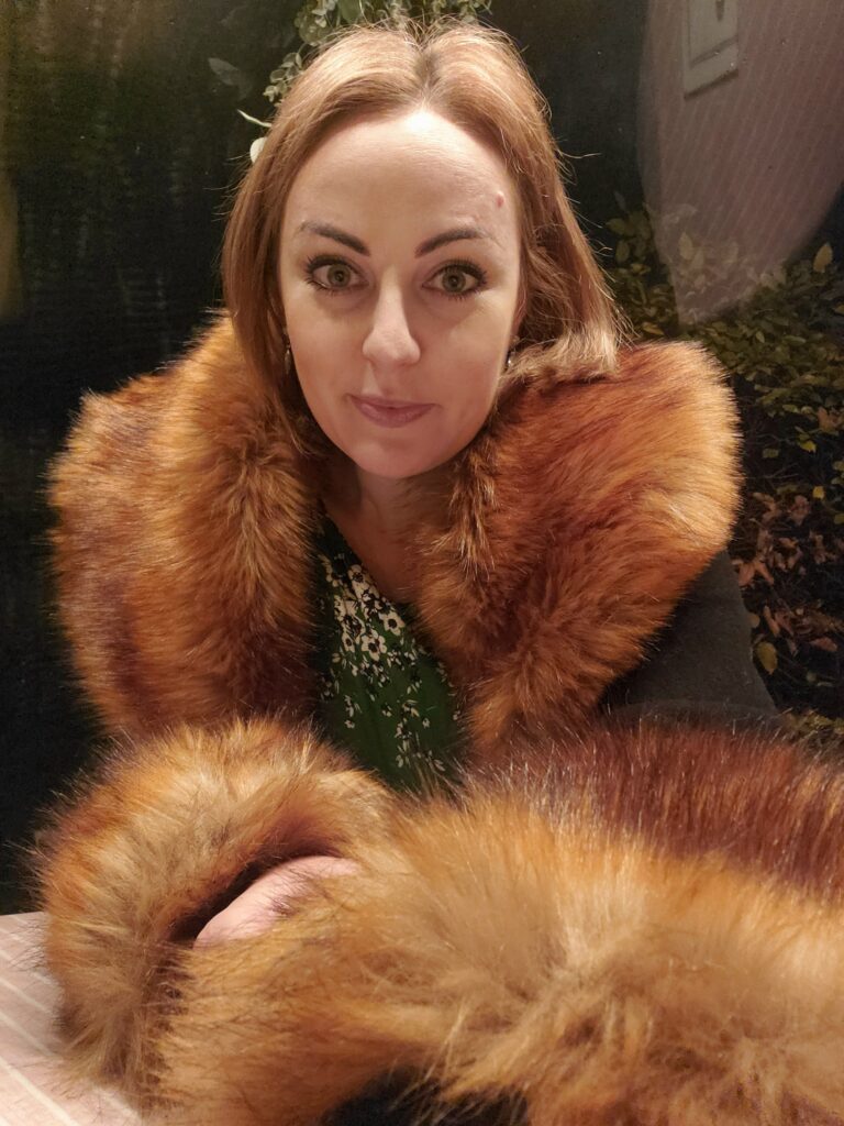 In the igloo, wearing my ridiculous coat