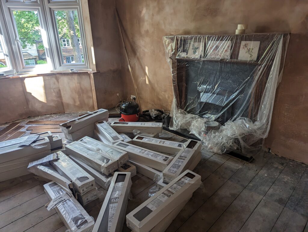 Freshly plastered 1930s walls and flooring to be laid